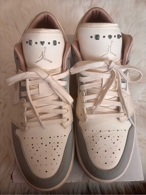 Woman’s Nike Air Jordan 1 Low “Sail Soft Pearl”